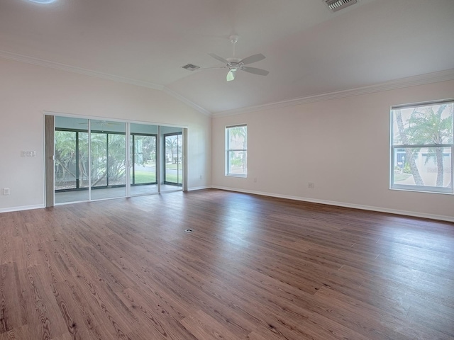 spare room featuring crown molding, hardwood / wood-style flooring, lofted ceiling, and ceiling fan