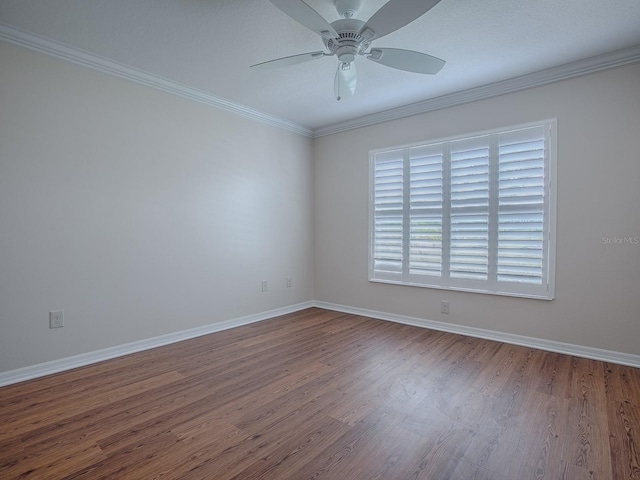 spare room with ornamental molding, hardwood / wood-style floors, and ceiling fan