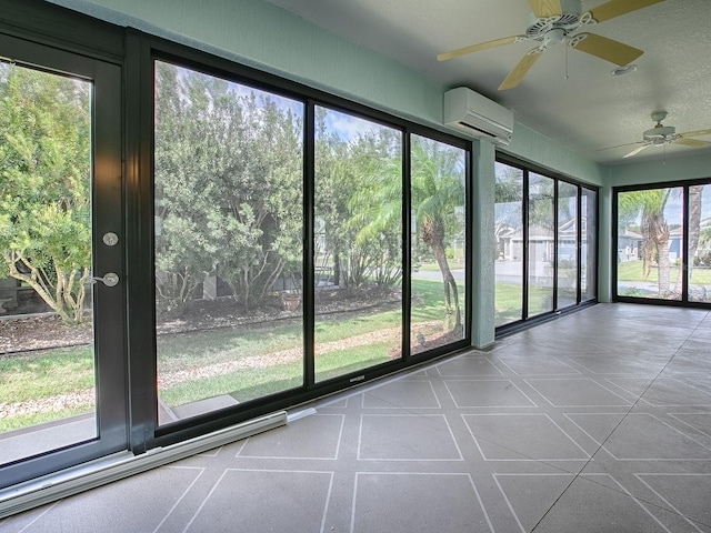 unfurnished sunroom with an AC wall unit, a healthy amount of sunlight, and ceiling fan