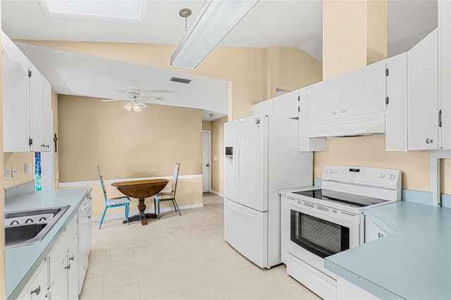 kitchen with custom range hood, sink, white cabinets, white appliances, and ceiling fan