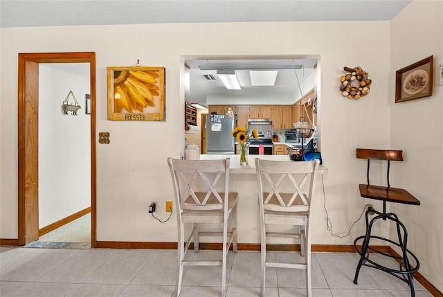 view of tiled dining room