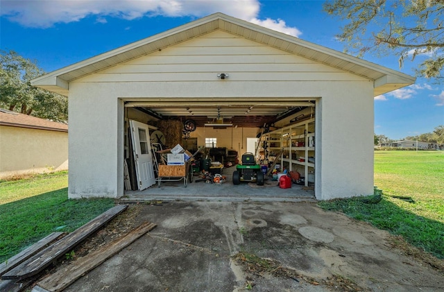 garage with a yard