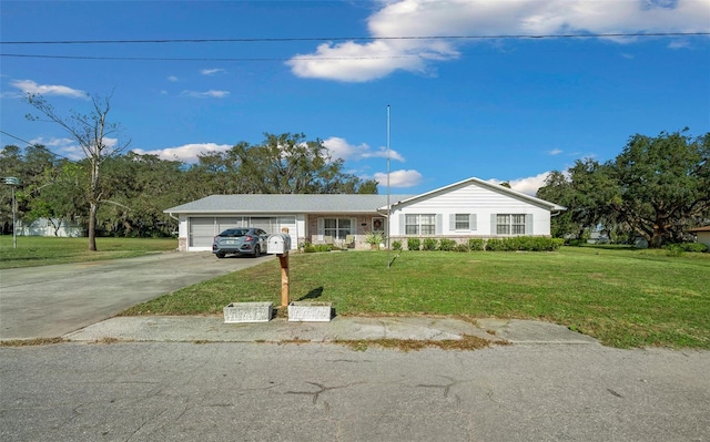 view of front facade featuring a front lawn and a garage