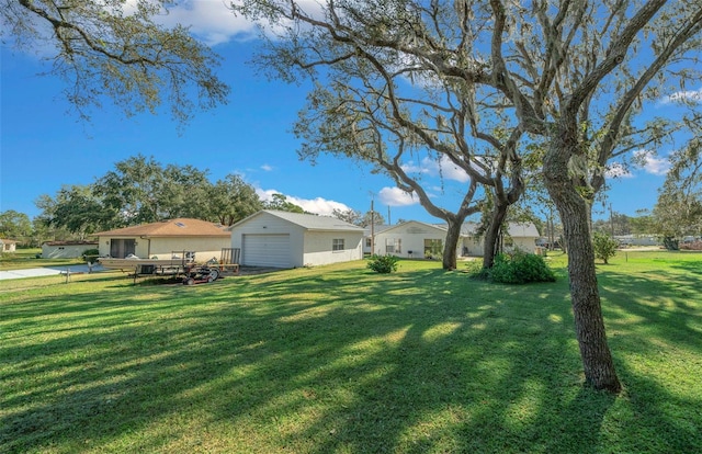 view of yard featuring a garage