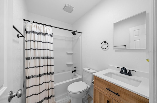 full bathroom featuring vanity, shower / bath combo, and toilet