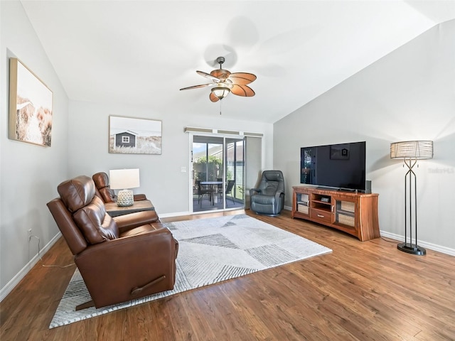 living room with lofted ceiling, wood-type flooring, and ceiling fan