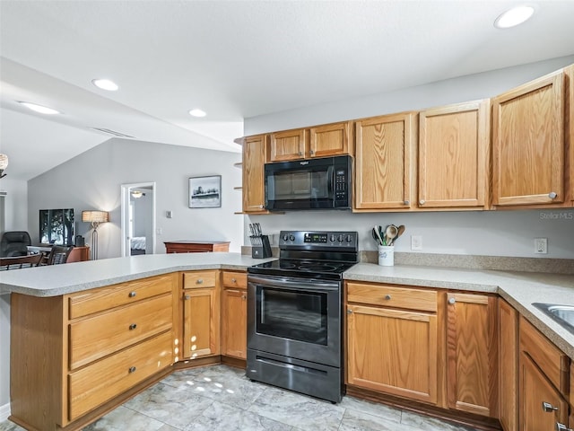 kitchen featuring electric range, black microwave, light countertops, a peninsula, and vaulted ceiling