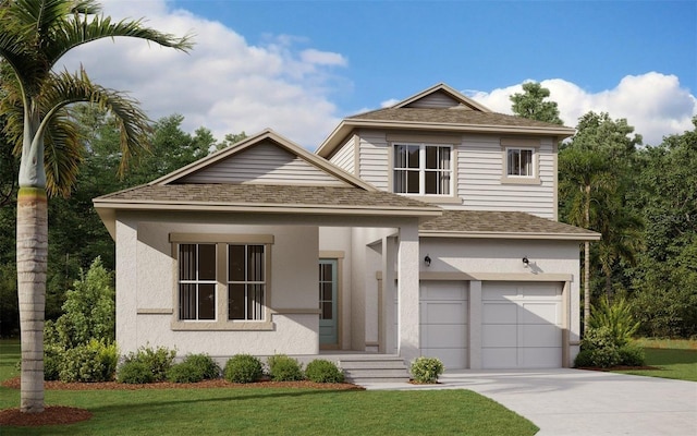 view of front facade with a garage and a front lawn