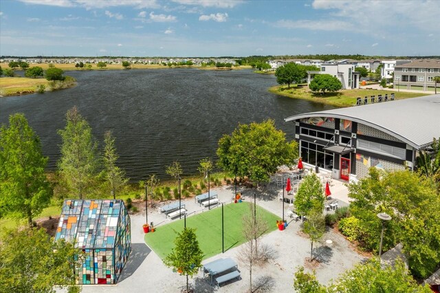 bird's eye view with a water view