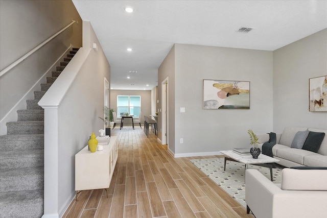 living room with light hardwood / wood-style floors