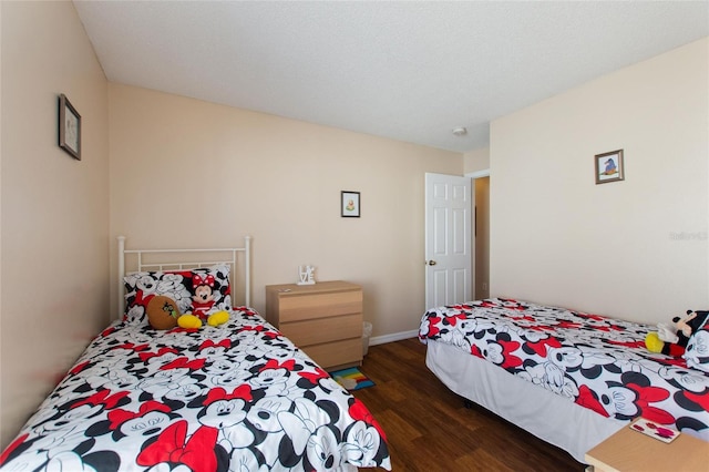 bedroom featuring dark hardwood / wood-style floors