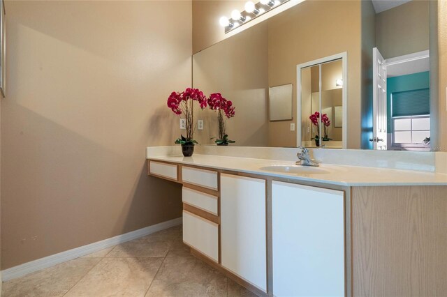 bathroom featuring vanity and tile patterned floors