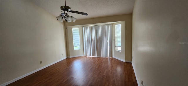 spare room featuring hardwood / wood-style flooring, ceiling fan, and a textured ceiling