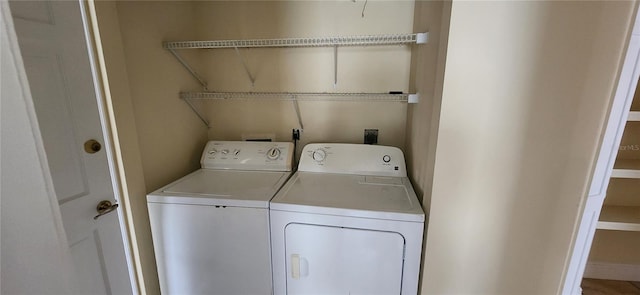 laundry area featuring separate washer and dryer