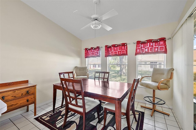 tiled dining room with ceiling fan