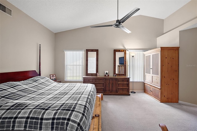 carpeted bedroom with a textured ceiling, high vaulted ceiling, and ceiling fan