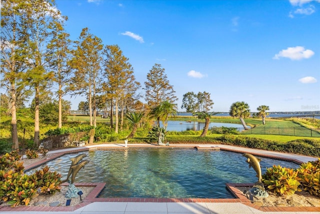 view of pool with a water view