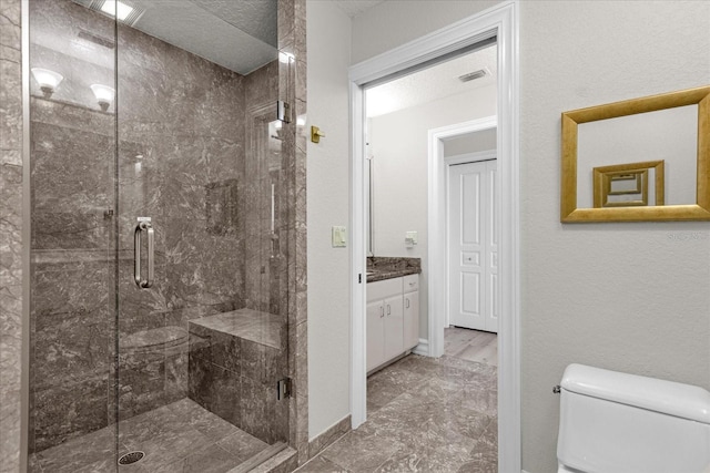 17601 Sawgrass Run, Tavares, FL 32778 - full bathroom featuring toilet, a stall shower, vanity, marble look tile flooring, and baseboards