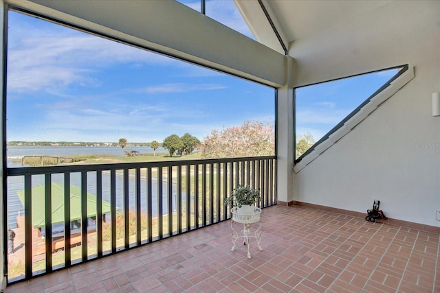 balcony featuring a water view