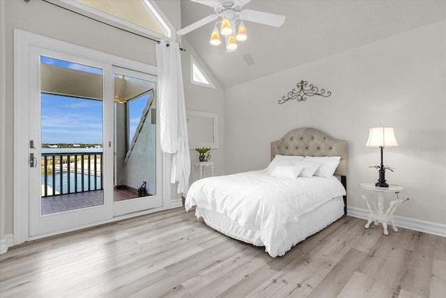 bedroom featuring ceiling fan, high vaulted ceiling, light hardwood / wood-style floors, and access to exterior