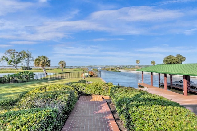 17601 Sawgrass Run, Tavares, FL 32778 - water view featuring fence and a dock