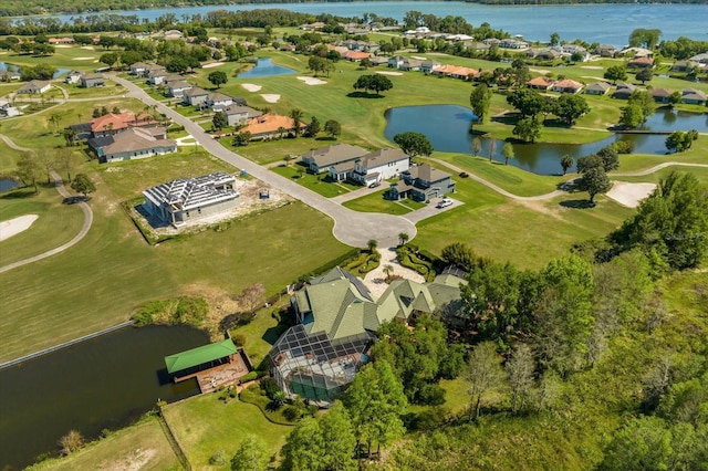 17601 Sawgrass Run, Tavares, FL 32778 - aerial overview of property's location featuring nearby suburban area, a large body of water, and a golf course