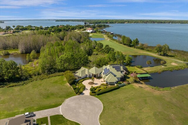 17601 Sawgrass Run, Tavares, FL 32778 - aerial view of property and surrounding area with a large body of water
