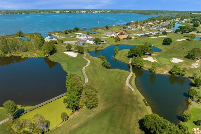 17601 Sawgrass Run, Tavares, FL 32778 - aerial view of property's location featuring a golf course, nearby suburban area, and a nearby body of water