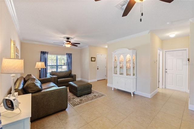 living room with visible vents, crown molding, baseboards, and light tile patterned flooring