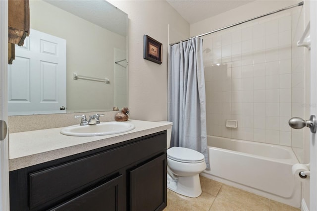 full bathroom with shower / bath combination with curtain, toilet, vanity, a textured ceiling, and tile patterned flooring