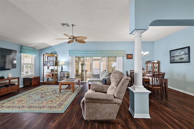 living room featuring a textured ceiling, dark wood-type flooring, ceiling fan with notable chandelier, and vaulted ceiling