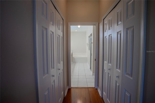 hallway featuring hardwood / wood-style floors