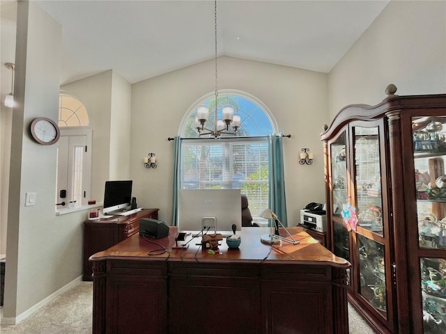 office with an inviting chandelier, light colored carpet, and vaulted ceiling