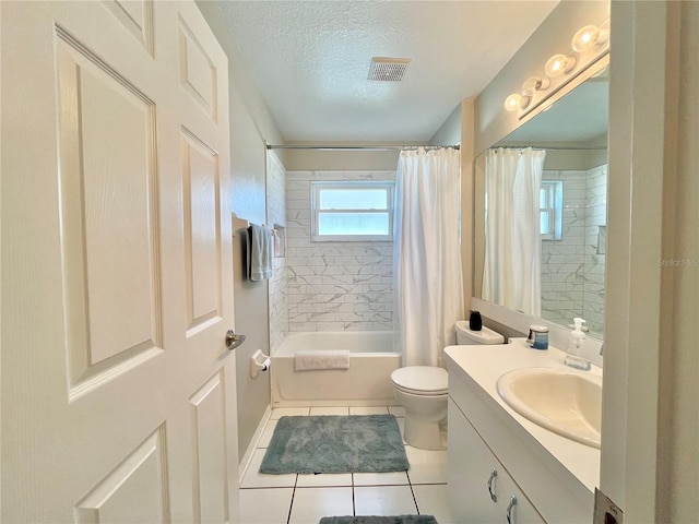 full bathroom featuring a textured ceiling, toilet, tile patterned floors, shower / bath combo with shower curtain, and vanity