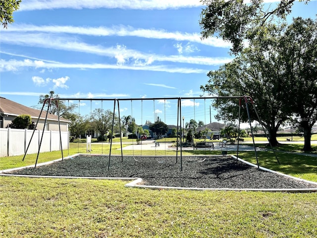 view of playground with a yard