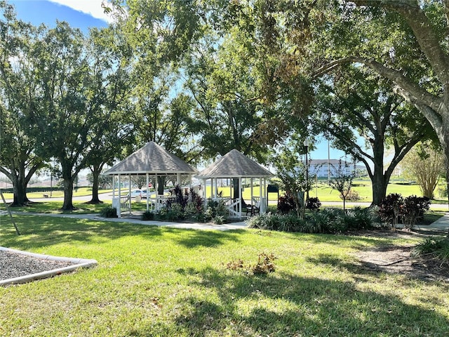 surrounding community featuring a yard and a gazebo