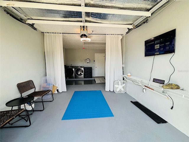 view of patio with washing machine and clothes dryer