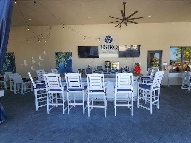 view of patio with ceiling fan