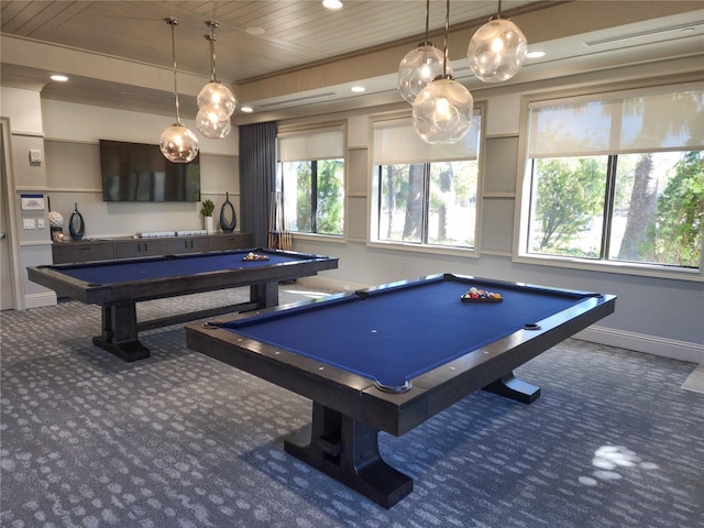 game room featuring pool table, a healthy amount of sunlight, and dark colored carpet