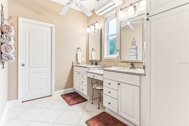 bathroom featuring ceiling fan, tile patterned flooring, vanity, baseboards, and a wall mounted air conditioner