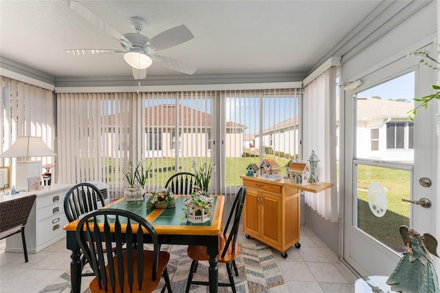 dining room featuring ceiling fan and light tile patterned flooring