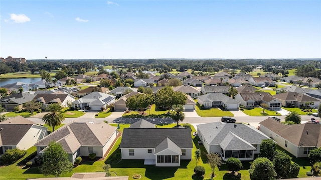 1312 Landeros Ln, The Villages, FL 32159 - bird's eye view featuring a water view and a residential view