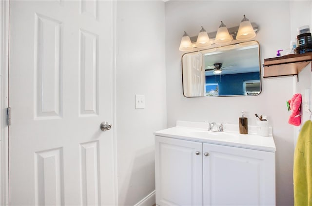 bathroom featuring vanity and ceiling fan