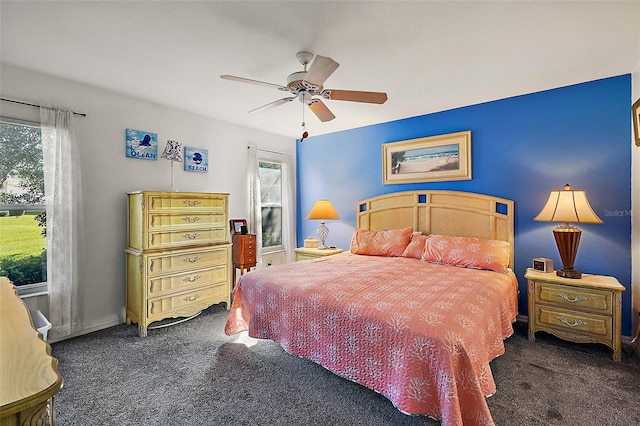 carpeted bedroom featuring ceiling fan