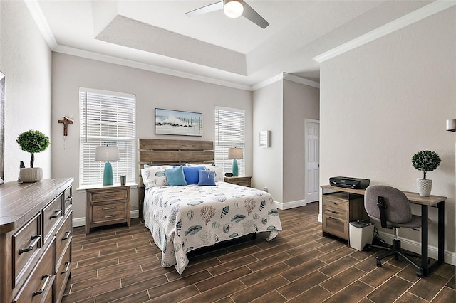 bedroom with ceiling fan, multiple windows, and dark hardwood / wood-style floors