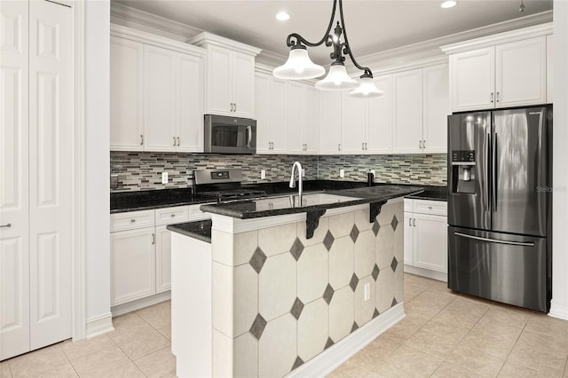 kitchen featuring light tile patterned floors, white cabinetry, and stainless steel appliances