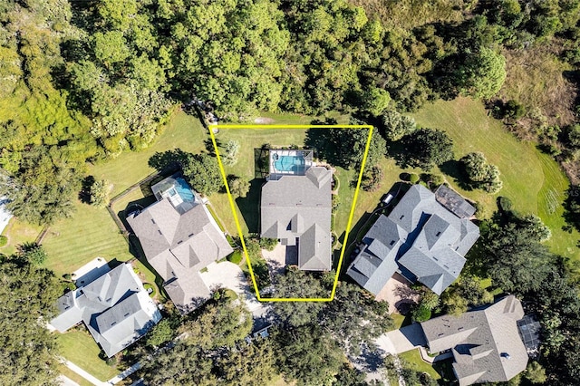 birds eye view of property with a residential view