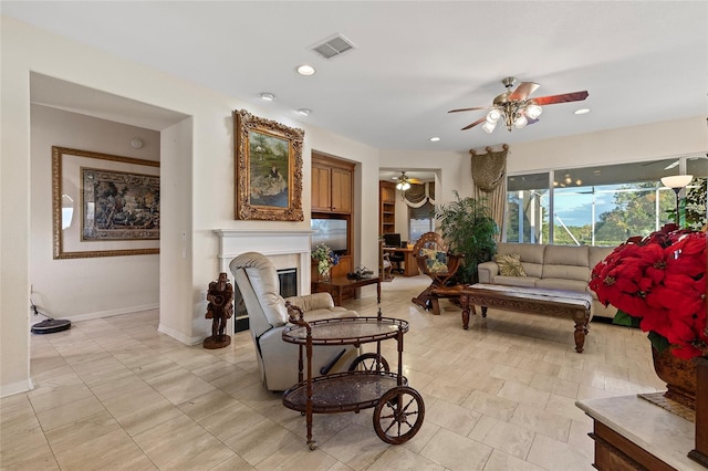 living room with ceiling fan