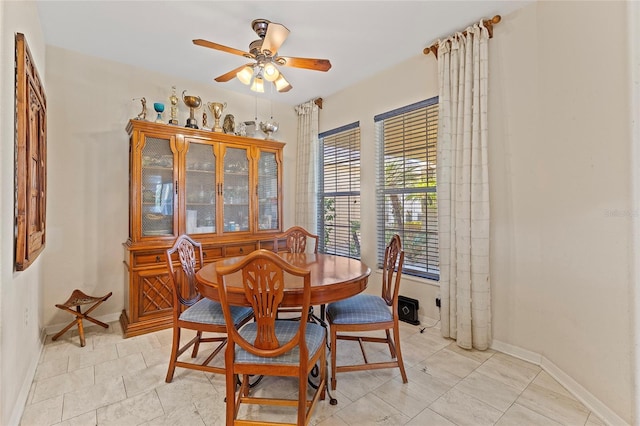 dining room with ceiling fan