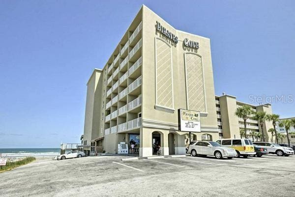 view of building exterior featuring a water view